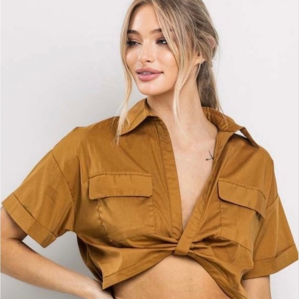 Brand new top comes in black or copper